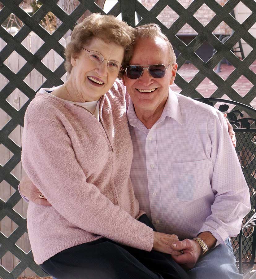 Smiling elder couple