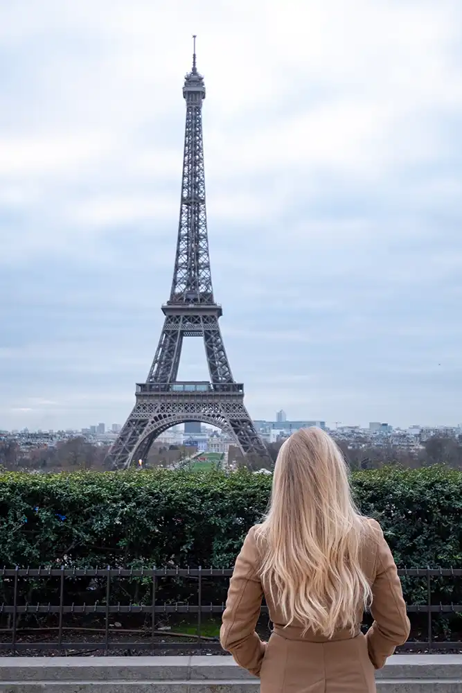 Woman looking at Eiffel tower
